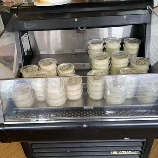 Refrigerated display with flavored butters. Thought they were cream cheeses. Lol.