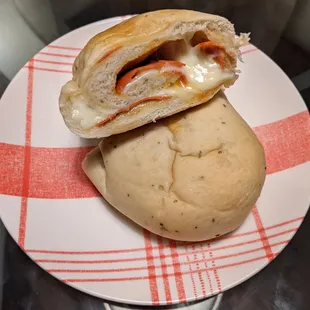 Pepperoni in soft herbed dough with gooey melted cheese. I keep a few of these at home for a quick dinner. So good!