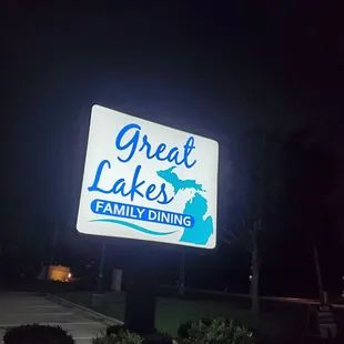 great lakes family dining sign at night