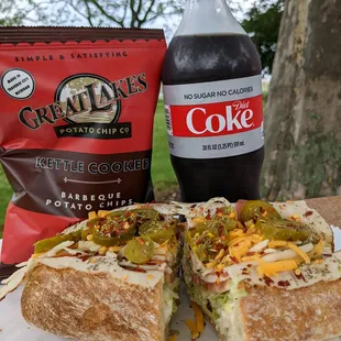 a bag of coke and a sandwich