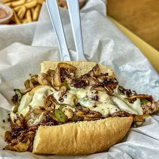 a sub sandwich and fries