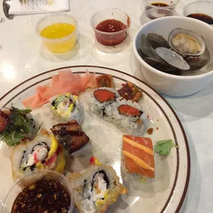 Sushi and steamed clams