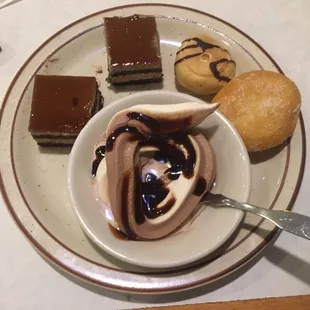 mocha cake, cream puff, sweet biscuit, chocolate and vanilla ice cream