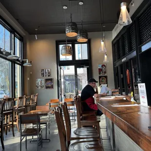 a woman sitting at a bar