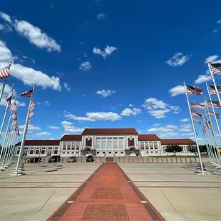 Front of the station viewed from the promenade of U.S. flags