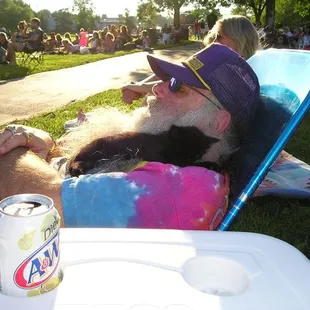 Bodacious (in his favorite place snuggling in my beard) af the  Trampled Under Foot concert in Blue Springs at Rotary Park.