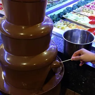 Chocolate waterfall in full stream