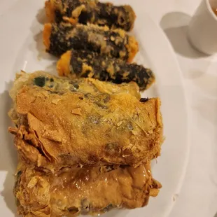 a plate of food and a cup of coffee