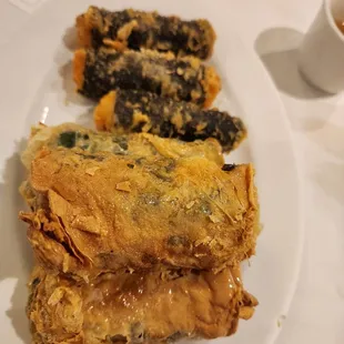 a plate of food and a cup of coffee