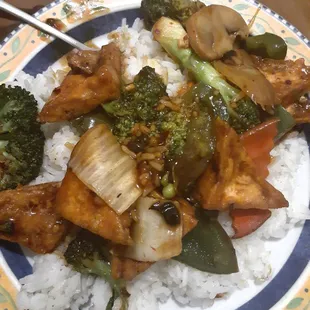 Mixed vegetables with tofu and Hunan sauce over rice