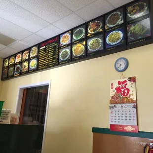 Menu on the wall. I hope the food looks like the photos.