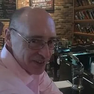 Mark E.