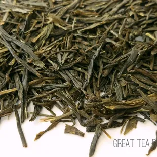 a pile of green tea leaves
