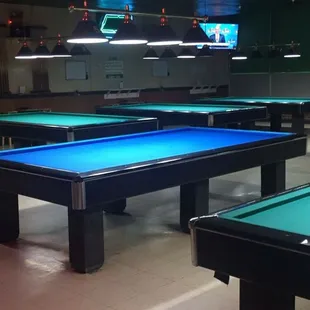 a pool table and a tv