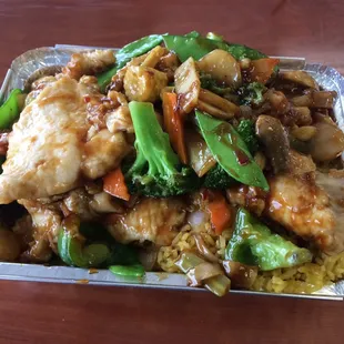 a plate of chicken and vegetables