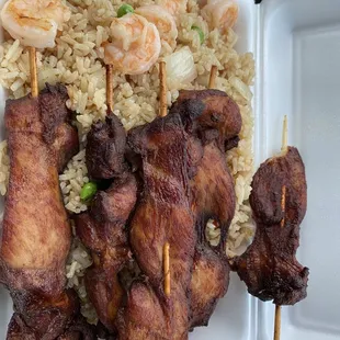 a tray of rice and meat