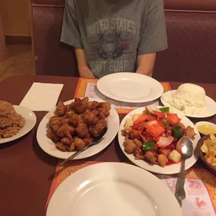 Orange chicken and sweet and sour chicken with white rice and fried rice. First time being here, and definitely coming again!