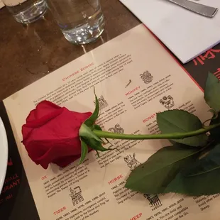 Valentine&apos;s day roses for the ladies at the table. How sweet  love this place