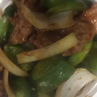 a plate of food with meat and vegetables