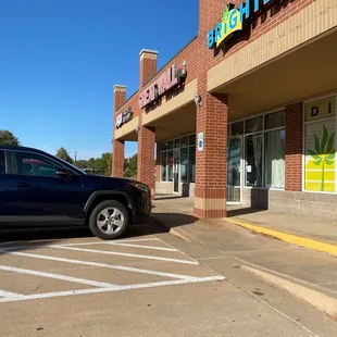 a car parked in front of a store