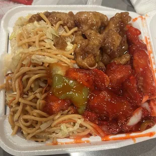 Orange chicken, sweet and sour chicken, half noodles and half fried rice combo plate