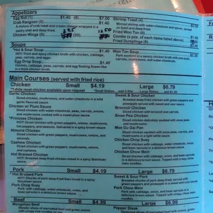 a person holding a menu