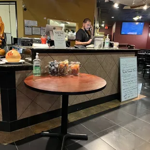 a man working at a restaurant counter