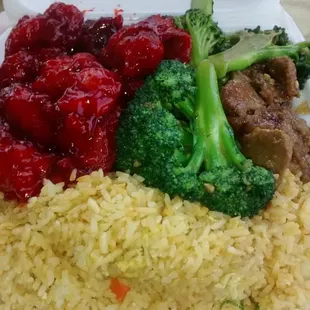 Sweet and sour chicken, beef and broccoli, and fried rice.