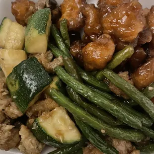 a close up of a meal in a styrofoam container