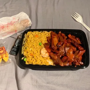 Boneless Spare Ribs combination meal with Shrimp Fried Rice, a fortune cookie and an egg roll that my goddaughter enjoyed.