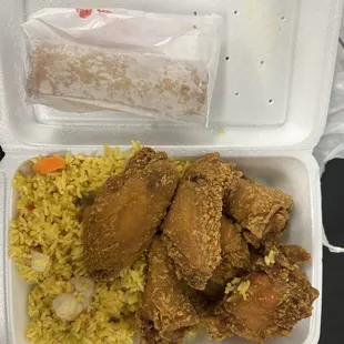 Shrimp fried rice, fried chicken and egg roll