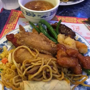 a plate of chinese food on a table