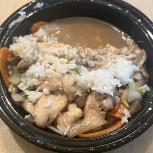 a bowl of chicken and rice