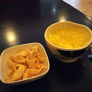 Complementary egg drop soup and fried wonton shells