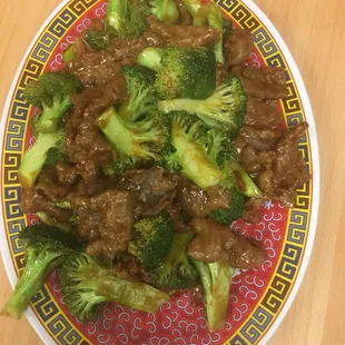 a plate of beef and broccoli