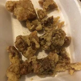 Chicken without the sesame sauce poured over it. Notice how VERY dark some pieces are.