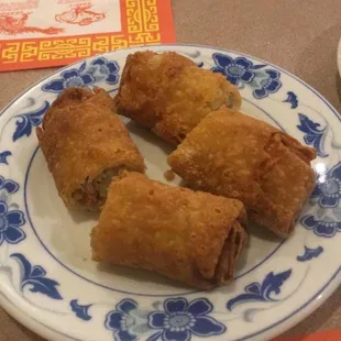 a plate of chinese food on a table