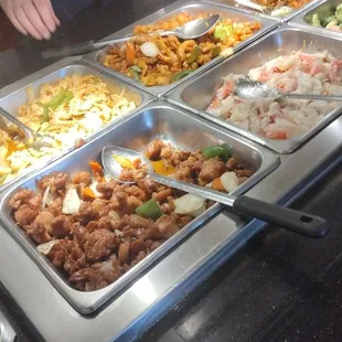 a buffet full of food