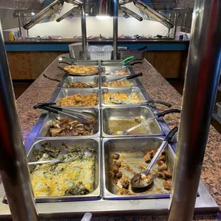 a buffet full of food