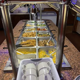 a buffet with many different types of food