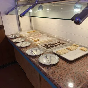 a buffet with a variety of food items