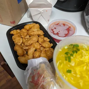 Sweet and sour chicken with white rice. Large egg drop soup with extra wontons