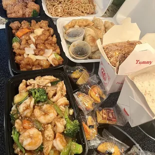 walnut shrimp, beef lo mein, sweet and sour pork, potstickers, shrimp and chicken garlic, beef fried rice, regular rice.