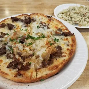 Delicious cheesesteak pita pizza