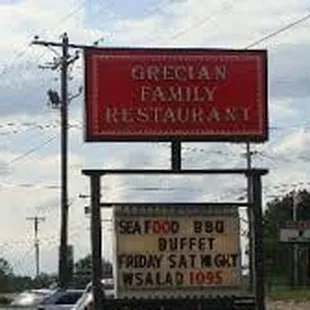 a sign for grecian family restaurant