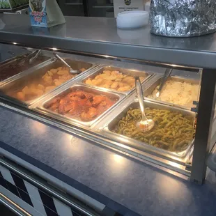 a buffet with a variety of food items