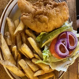 Fried Chicken sandwich with a side of French fries.
