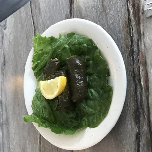 a plate of food on a wooden table