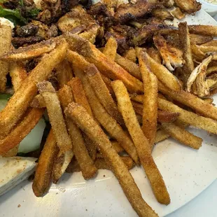 Spicy fries with too much seasoning.