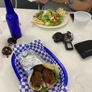 Falafel pita and Greek salad